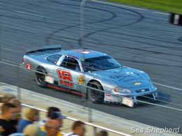 Champion Driver Zack Jarrell races his #18 Chevrolet Impala, which carried the Sea Shepherd Jolly Roger logo, in Saturday's FASCAR Pro Late Models 100 race at Florida's New Smyrna Speedway